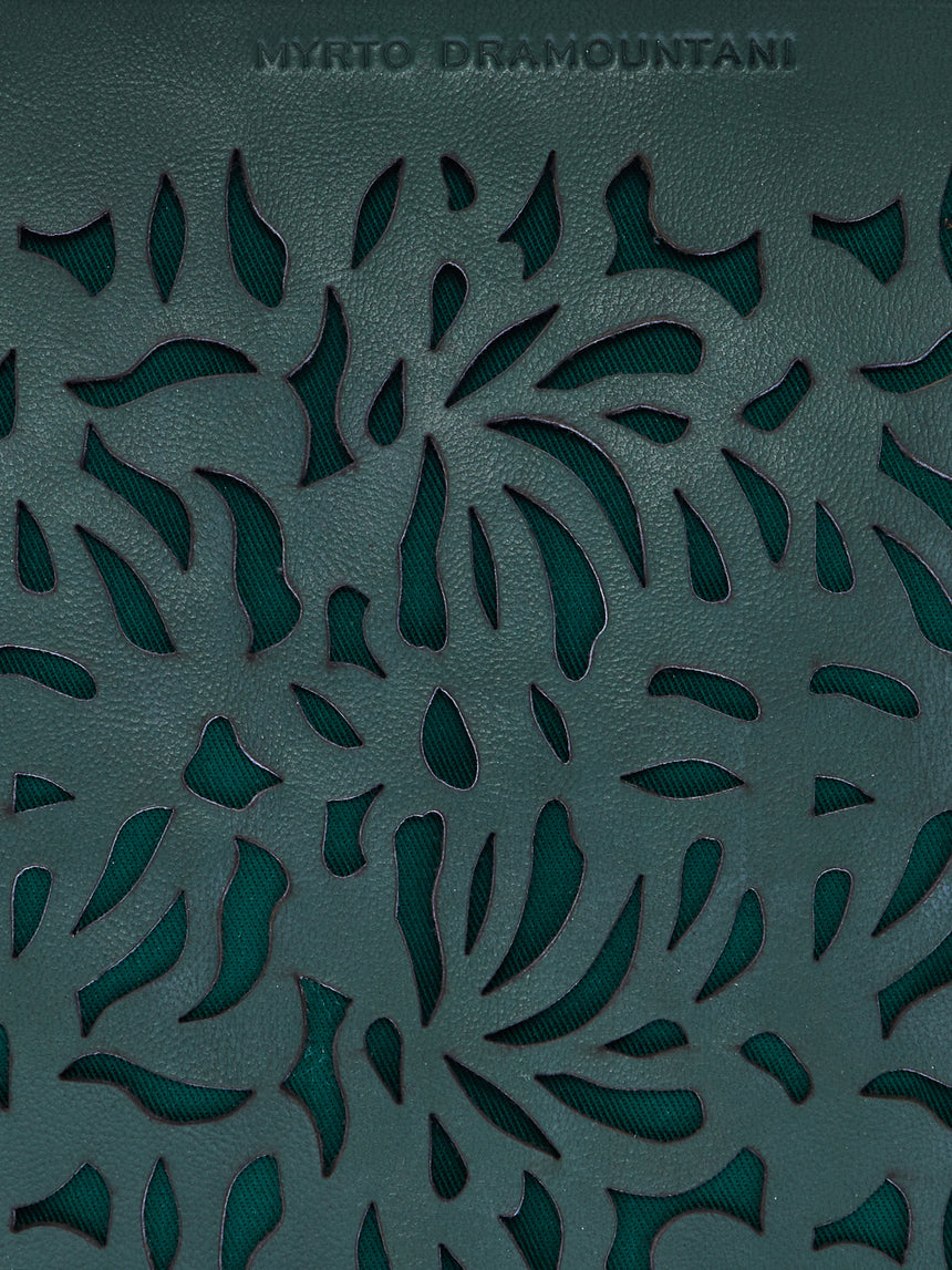 Green laser-cut leather clutch